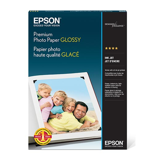 A box of Epson Premium Photo Paper Glossy by Epson, with a photo of a smiling family on the front. The packaging features English and French text, highlighting its glossy, high-quality finish for inkjet printers.