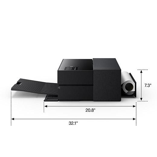 Side view of the Epson SureColor P700 13” Wide Photo Printer (C11CH38201) with tray extended, perfect for pros. Measures 7.3" H x 20.8" D x 32.1" L with tray open; visible paper roll at back.