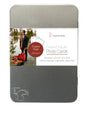 The Hahnemuhle FineArt Pearl tin holds 30 premium 4.0 x 5.9 in inkjet photo cards (285 gsm, pearl finish, 100% cellulose) and features a label with a man and violin case by a lake—ideal for creative projects.