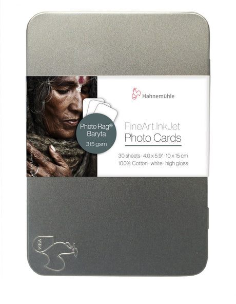 A Hahnemuhle tin with 30 Hahnemühle Photo Rag® Baryta cards (4.0 x 5.9 in, 315 gsm), featuring a label photo of an elderly person with closed eyes and hand on chest.