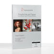 A pack of Hahnemuhle Photo Rag® Bright White, premium cotton Matt FineArt paper, features a white cover with the brand logo, product name, and sample images: portrait, abstract art, and an elephant.