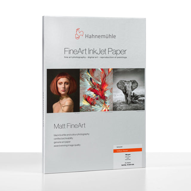 A package of Hahnemuhle William Turner 310 gsm, a mould-made Matt FineArt inkjet paper, features three sample images—a woman’s portrait, an abstract painting, and an elephant—on mostly white packaging with red and gray accents.