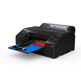 The Epson SureColor P5370 17" Wide Printer (SCP5370SE) by Epson prints a vibrant page with shoe images on a blue and red background. It features a digital display and control buttons on the front.