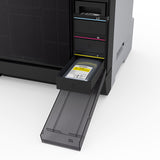 A close-up of the Epson SureLab D1070DE Professional Minilab Photo Printer shows its front panel open, revealing four labeled ink cartridge slots. The yellow cartridge is partially pulled out, while cyan, magenta, and light cyan slots stay closed.