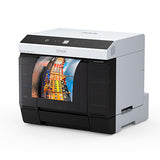 An Epson SureLab D1070DE Professional Minilab Photo Printer with Double-Sided Printing (SLD1070DE) prints a vibrant photo of waterfront buildings with reflections on a plain white background.