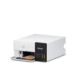 The Epson SureLab D570 Professional Minilab Photo Printer (SLD570SE) by Epson, a compact white model with a front panel ink level display, is printing a vibrant photo against a plain white background.