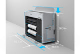 An Epson SureColor T3770DE 24" Wide-Format Dual-Roll CAD/Technical Printer by Epson is shown against a wall, with arrows marking its size: 53.7" wide, 19.6" deep, and 38.3" high. Two internal paper rolls are visible.