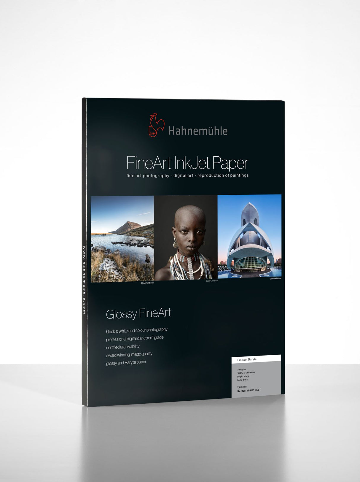 A pack of Hahnemuhle Fine Art Baryta glossy inkjet paper is shown against a white background, featuring sample images of a landscape, a child’s portrait, and a modern building.