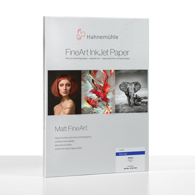 A package of Hahnemuhle Photo Rag® (188) archival photo paper with images of a woman, abstract art, and an elephant; the label highlights Matt FineArt, product details, and FineArt inkjet printing suitability.