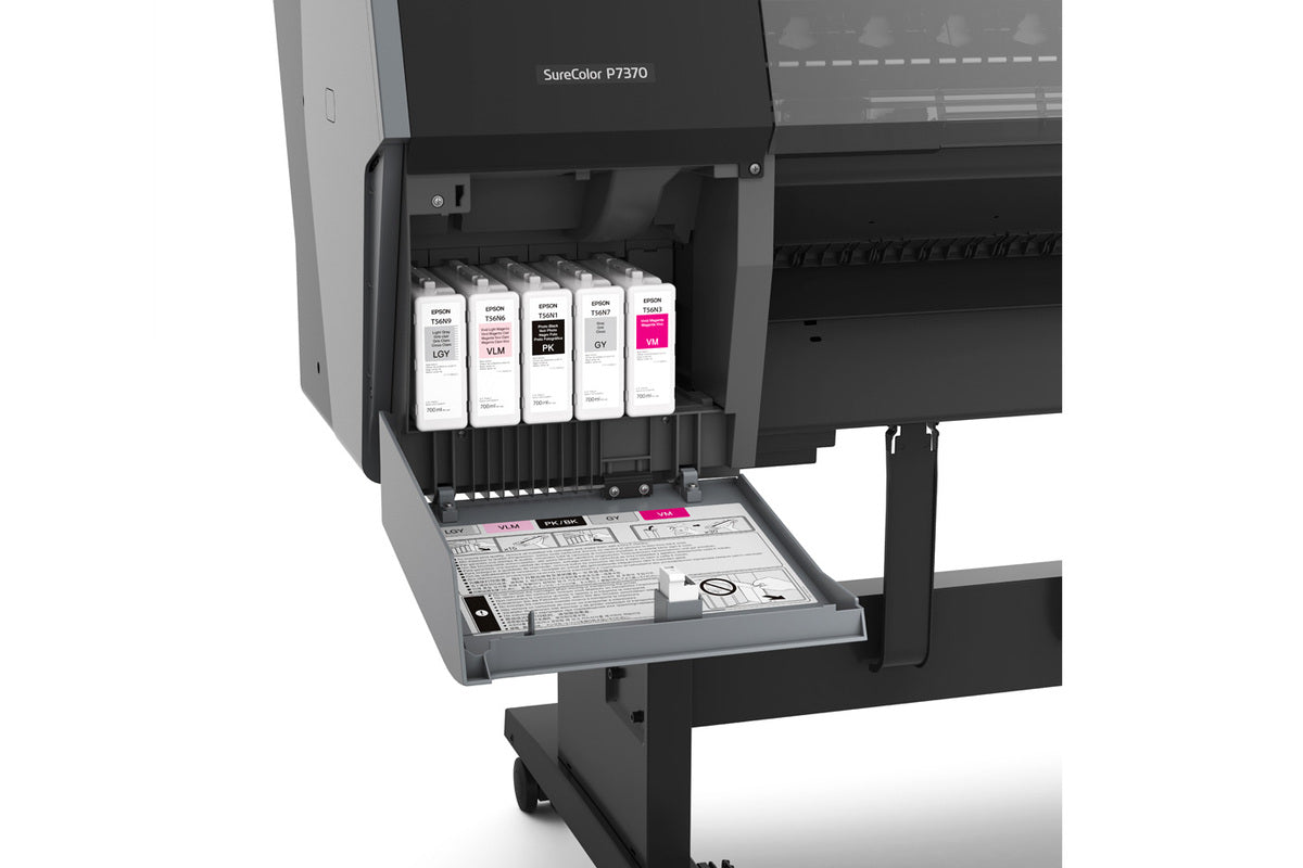 Close-up of the Epson SureColor P7370 24" Wide Printer (SCP7370SE) by Epson, showing its open ink cartridge compartment with six UltraChrome PRO10 cartridges and a detailed diagram on the inside of the door.