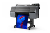 The Epson SureColor P7370 24" Wide Printer (SCP7370SE) by Epson prints vibrant images, like a person in red with a red hat and blue smoke on a white background—ideal for professional photography printing.