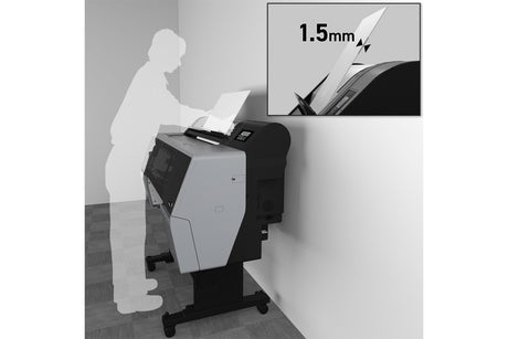 A person uses the Epson SureColor P7370/P9370 24"/44" Wide Printer (SCP7370SE/SCP9370SE) by Epson, placed against a wall. An inset highlights a 1.5 mm gap between the printer lid and the wall.