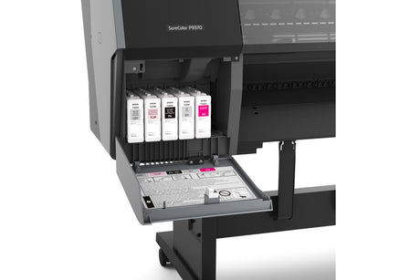 Close-up of an Epson SureColor P9370 44" Wide Printer (SCP9370SE) with its ink cartridge compartment open, displaying six UltraChrome PRO10 Ink cartridges and an instruction sheet on the pull-out tray below.