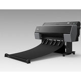 The Epson SureColor P9570 44” Wide Printer (SCP9570SE) by Epson prints a broad black sheet that rolls onto the floor, set against a plain gray backdrop, showcasing its UltraChrome PRO12 Ink capabilities and mobile design.