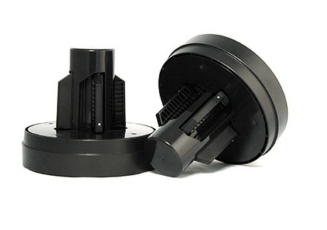 Two black cylindrical Roll Media Adapters – Epson P-Series (C12C935931) by Epson are shown, one upright and one on its side, both featuring vertical slots, compatible with select Epson printers, against a white background.