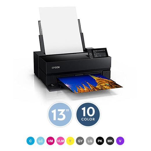 A black Epson printer prints a colorful photo of a cathedral. Paper is loaded on top. Below, icons indicate 13-inch paper and 10-color printing, with colored circles showing the available ink colors.