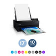 An Epson SureColor P900 17” Wide Photo Printer with a piece of colorful artwork being printed. The printer is black with a LCD Touchscreen  display, and it's producing a vibrant color print using the Ultrachrome PRO10 inks
