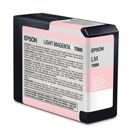 The Epson Pro 3800 Light Magenta Ink Cartridge 80ml (T580600) uses Epson UltraChrome K3 pigment ink for archival prints and has detailed warning and usage labels in multiple languages on its mostly black case with white and pink accents.